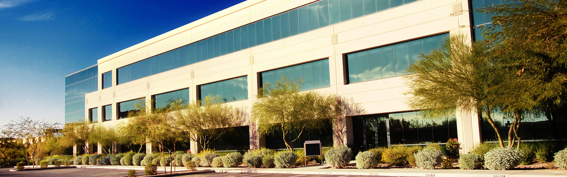 Outdoor View Of Glass Office Building 